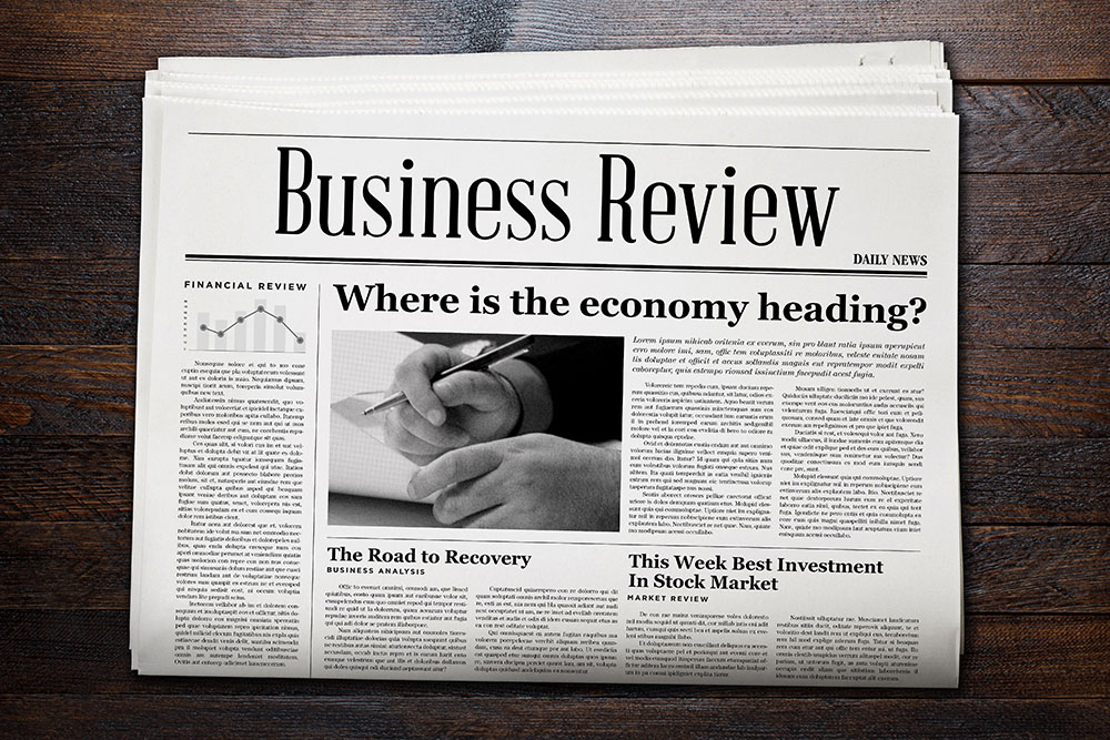 עיתון עם הכותרת business review